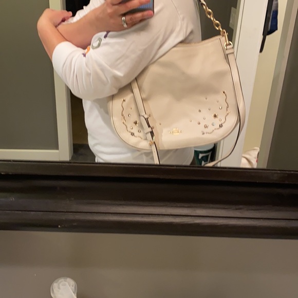 Beige coach purse with metal detailing - Picture 4 of 5